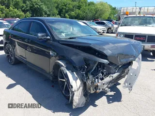 2014 Ford Taurus SEL with VIN 1FAHP2E8XEG133992, listed as a IAAI auction lot 42223678 with 201,204 mi miles and . Bid and sale history available at carsss.com. Image 1.