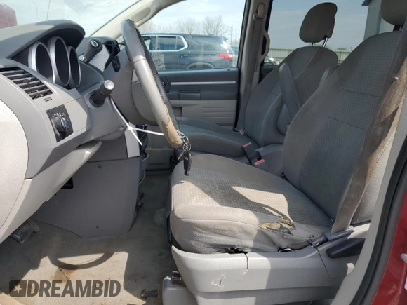 2010 Dodge Grand Caravan Hero with VIN 2D4RN3D14AR401543, listed as a Copart auction lot 53802445 with 237,283 mi miles and Salvage Title. Bid and sale history available at DreamBid. Image 7.