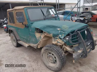 1997 Jeep Wrangler SE with VIN 1J4FY29P1VP408966, listed as a IAAI auction lot 41683640 with 106,910 mi miles. Bid and sale history available at carsss.com. Image 1.