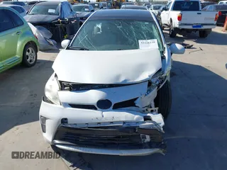 2014 Toyota Prius Four z VIN JTDKN3DU9E1755013, wystawiony jako IAAI lot #42228158 z przebiegiem 136 391 mil mil oraz . Historia ofert i sprzedaży dostępna na DreamBid. Obrazek 13.