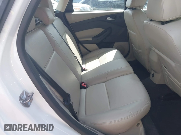 2014 Ford Focus Electric with VIN 1FADP3R49EL355751, listed as a IAAI auction lot 42628237 with 56,551 mi miles and . Bid and sale history available at DreamBid. Image 8.