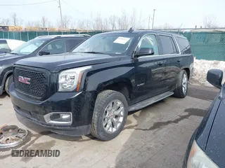 2016 GMC Yukon SLE with VIN 1GKS2AKC3GR398556, listed as a IAAI auction lot 41585972 with 130,961 mi miles. Bid and sale history available at carsss.com. Image 19.