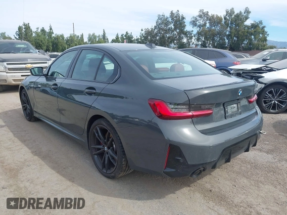 2024 BMW 3 Series 330i with VIN 3MW69FF04R8E27076, listed as a IAAI auction lot 41669381 with 12,057 mi miles. Bid and sale history available at carsss.com. Image 3.