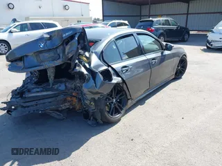 2021 BMW 3 Series 330i с VIN 3MW5R1J03M8B96458, выставлен на аукционе IAAI как лот 42355921 с пробегом Не указан миль и . История ставок и продаж доступна на DreamBid. Изображение 4.