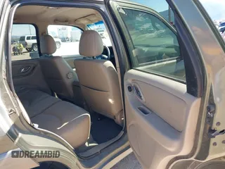 2002 Mazda Tribute LX with VIN 4F2CU08152KM02067, listed as a IAAI auction lot 42198970 with 212,613 mi miles and . Bid and sale history available at carsss.com. Image 8.