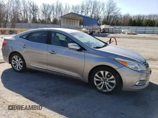 2013 Hyundai Azera с VIN KMHFG4JG8DA256908, выставлен на аукционе Copart как лот 50573915 с пробегом 146 015 миль миль и Списание • Salvage title. История ставок и продаж доступна на DreamBid. Изображение 4.