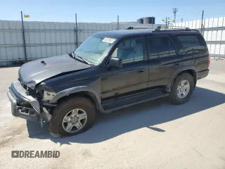 1999 Toyota 4Runner SR5 with VIN JT3HN86R9X0220647, listed as a Copart auction lot 66506005 with 227,856 mi miles and Salvage title. Bid and sale history available at DreamBid. Image 1.