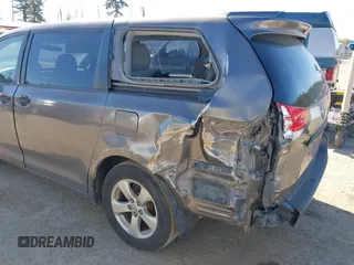 2013 Toyota Sienna L with VIN 5TDZK3DC1DS400675, listed as a IAAI auction lot 42053231 with 85,070 mi miles. Bid and sale history available at carsss.com. Image 6.
