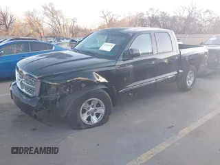 2008 Dodge Dakota Laramie with VIN 1D7HW58N18S593890, listed as a IAAI auction lot 41762135 with 109,669 mi miles. Bid and sale history available at carsss.com. Image 2.