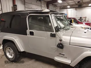 2005 Jeep Wrangler Unlimited with VIN 1J4FA44S05P359173, listed as a IAAI auction lot 41275179 with 75,035 mi miles. Bid and sale history available at carsss.com. Image 13.