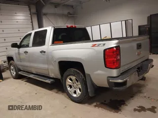 2014 Chevrolet Silverado 1500 LT with VIN 3GCUKREC4EG291351, listed as a IAAI auction lot 41732290 with 194,135 mi miles and . Bid and sale history available at DreamBid. Image 14.