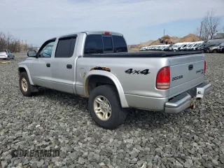 2004 Dodge Dakota SLT with VIN 1D7HG48NX4S677465, listed as a Copart auction lot 51044735 with 196,854 mi miles and Clean title. Bid and sale history available at DreamBid. Image 2.