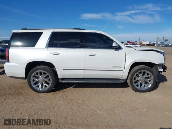 2020 GMC Yukon Denali with VIN 1GKS2CKJ3LR260455, listed as a IAAI auction lot 41690495 with 92,498 mi miles. Bid and sale history available at carsss.com. Image 13.
