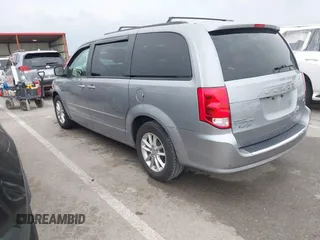 2014 Dodge Grand Caravan SXT with VIN 2C4RDGCG0ER417662, listed as a IAAI auction lot 41933279 with 156,751 mi miles and . Bid and sale history available at DreamBid. Image 3.