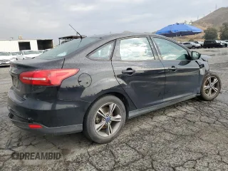 2018 Ford Focus SE with VIN 1FADP3FE8JL300246, listed as a Copart auction lot 59585035 with 83,141 mi miles and Salvage title. Bid and sale history available at DreamBid. Image 3.