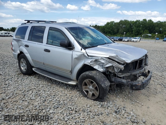 2004 Dodge Durango Limited with VIN 1D4HD58D94F154997, listed as a Copart auction lot 58973804 with 208,595 mi miles and Salvage title. Bid and sale history available at DreamBid. Image 4.
