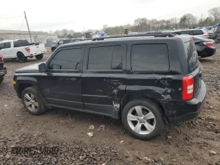 2013 Jeep Patriot Latitude with VIN 1C4NJPFB1DD255761, listed as a Copart auction lot 52772015 with 184,635 mi miles and Salvage Title. Bid and sale history available at carsss.com. Image 2.