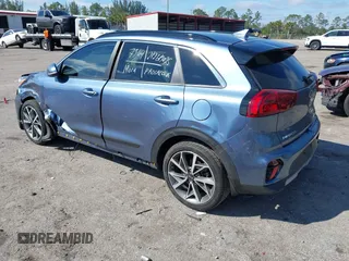 2021 Kia Niro Touring with VIN KNDCC3LC3M5483455, listed as a IAAI auction lot 41678795 with 132,216 mi miles. Bid and sale history available at carsss.com. Image 3.