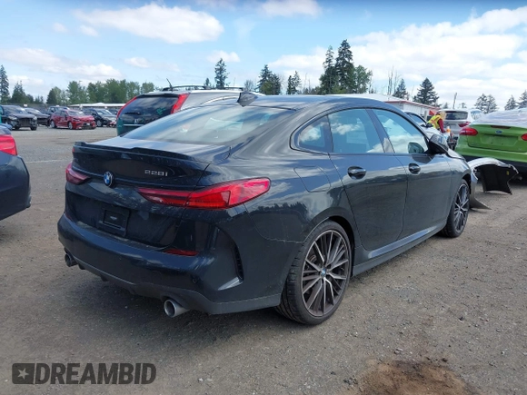 2020 BMW 2 Series 228i xDrive with VIN WBA73AK00L7F77132, listed as a IAAI auction lot 42129698 with 27,989 mi miles and . Bid and sale history available at DreamBid. Image 4.