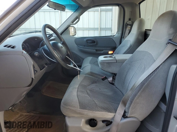 1999 Ford F-150 XL with VIN 1FTRF17L7XNA73732, listed as a Copart auction lot 74388514 with Not provided miles and Clean title. Bid and sale history available at DreamBid. Image 7.