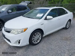 2012 Toyota Camry Hybrid XLE with VIN 4T1BD1FKXCU030157, listed as a IAAI auction lot 42040131 with 237,412 mi miles. Bid and sale history available at carsss.com. Image 2.