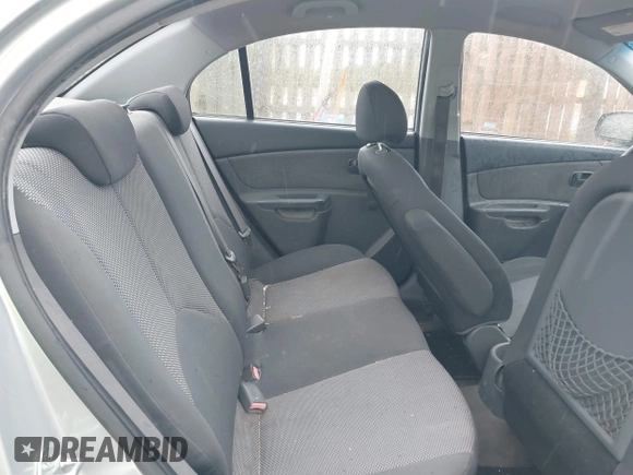 2009 Kia Rio SX with VIN KNADE223596538965, listed as a IAAI auction lot 42029409 with 143,794 mi miles. Bid and sale history available at carsss.com. Image 8.
