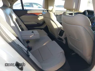 2014 Cadillac CTS Luxury AWD z VIN 1G6AX5SX3E0149360, wystawiony jako IAAI lot #41020479 z przebiegiem 98 917 mil mil oraz . Historia ofert i sprzedaży dostępna na DreamBid. Obrazek 8.