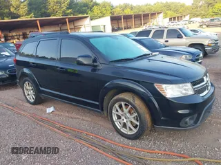 2015 Dodge Journey SXT with VIN 3C4PDCBG7FT556929, listed as a IAAI auction lot 42664149 with 191,980 mi miles and . Bid and sale history available at DreamBid. Image 1.