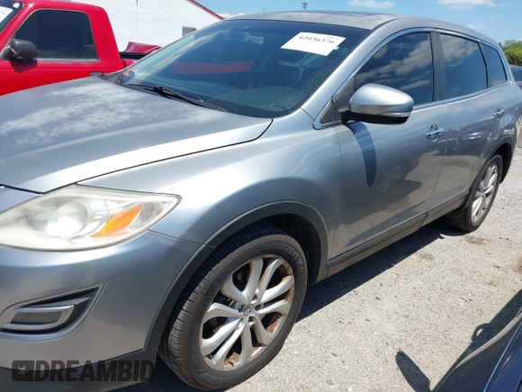 2011 Mazda CX-9 Grand Touring with VIN JM3TB3DA7B0300723, listed as a IAAI auction lot 42036376 with 248,308 mi miles. Bid and sale history available at carsss.com. Image 2.