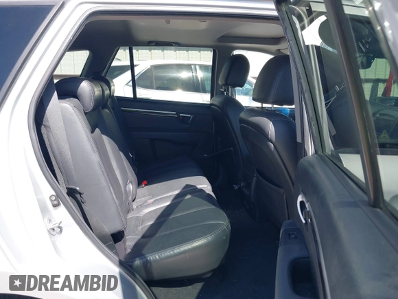 2009 Hyundai Santa Fe SE with VIN 5NMSH13E99H300552, listed as a IAAI auction lot 41772584 with 155,127 mi miles and . Bid and sale history available at DreamBid. Image 8.