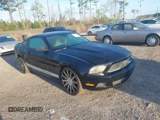 2011 Ford Mustang V6 with VIN 1ZVBP8AM6B5160195, listed as a IAAI auction lot 41803594 with 146,244 mi miles and . Bid and sale history available at carsss.com. Image 1.