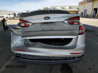 2019 Ford Fusion Hybrid SE with VIN 3FA6P0LU7KR262160, listed as a Copart auction lot 51969555 with 99,699 mi miles and Salvage Title. Bid and sale history available at carsss.com. Image 6.
