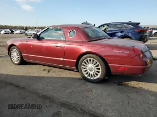2004 Ford Thunderbird Deluxe with VIN 1FAHP60A94Y109354, listed as a Copart auction lot 41472545 with 49,942 mi miles and Clean Title. Bid and sale history available at DreamBid. Image 2.