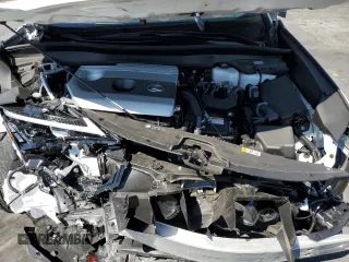 2024 Lexus UX with VIN JTHX6JBH7R2189588, listed as a Copart auction lot 70237664 with 9,963 mi miles and Salvage Title. Bid and sale history available at carsss.com. Image 14.
