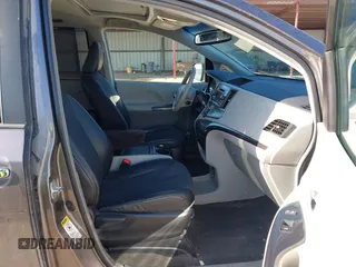 2014 Toyota Sienna SE with VIN 5TDXK3DC7ES482954, listed as a IAAI auction lot 41197465 with 160,107 mi miles and . Bid and sale history available at DreamBid. Image 5.