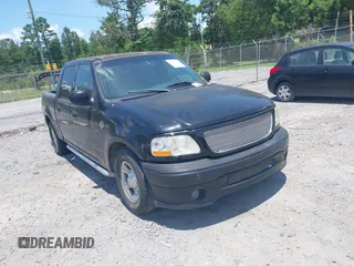2001 Ford F-150 XLT z VIN 1FTRW07L31KA17614, wystawiony jako IAAI lot #42522640 z przebiegiem Nie podano mil oraz . Historia ofert i sprzedaży dostępna na DreamBid. Obrazek 1.