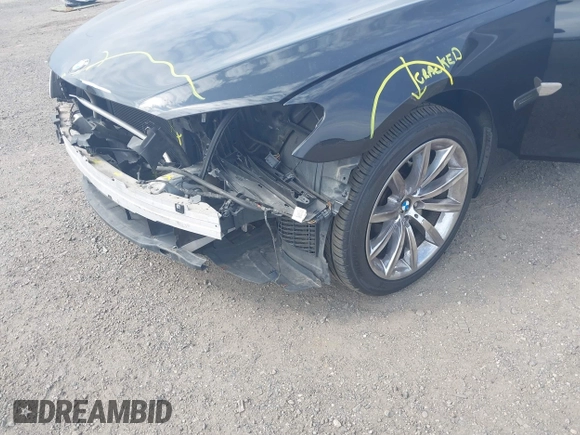 2015 BMW 7 Series 740Li xDrive with VIN WBAYF4C55FD874116, listed as a IAAI auction lot 41877144 with 156,280 mi miles. Bid and sale history available at carsss.com. Image 6.