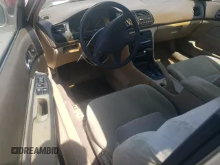 1994 Honda Accord LX with VIN 1HGCD7239RA002341, listed as a Copart auction lot 68715994 with 79,674 mi miles and Salvage Title. Bid and sale history available at carsss.com. Image 8.