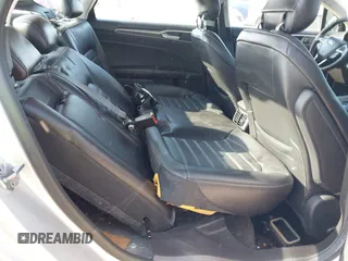 2013 Ford Fusion SE Hybrid with VIN 3FA6P0LU6DR127108, listed as a IAAI auction lot 42023529 with 250,057 mi miles. Bid and sale history available at carsss.com. Image 8.