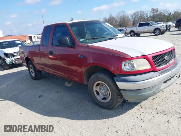 2000 Ford F-150 XL with VIN 1FTZX1729YNC32076, listed as a IAAI auction lot 41523364 with 216,726 mi miles. Bid and sale history available at carsss.com. Image 1.