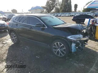 2019 BMW X2 sDrive28i with VIN WBXYJ3C55K5N39859, listed as a Copart auction lot 45276405 with 48,035 mi miles and Salvage Title. Bid and sale history available at carsss.com. Image 4.