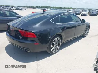 2012 Audi A7 Premium Plus with VIN WAUYGAFC4CN063645, listed as a IAAI auction lot 42561639 with 174,712 mi miles and . Bid and sale history available at DreamBid. Image 4.