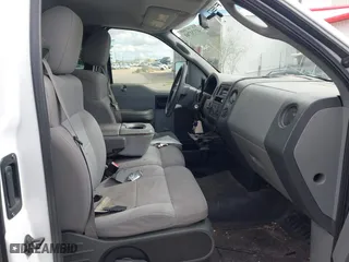 2005 Ford F-150 XL with VIN 1FTRF12W05NB36068, listed as a IAAI auction lot 41732744 with 203,261 mi miles. Bid and sale history available at carsss.com. Image 5.