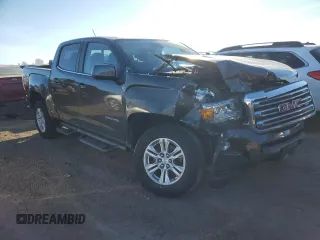 2019 GMC Canyon 4WD SLE with VIN 1GTG6CEN0K1266330, listed as a Copart auction lot 87117014 with 42,096 mi miles and Salvage Title. Bid and sale history available at carsss.com. Image 4.