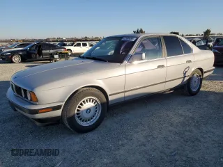 1990 BMW 5 Series with VIN WBAHC1319LBC91076, listed as a Copart auction lot 42598695 with 114,659 mi miles and Clean title. Bid and sale history available at DreamBid. Image 1.