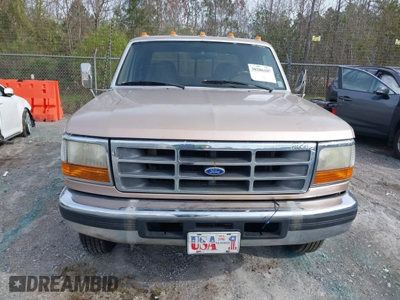1997 Ford F-350 z VIN 1FTJW35G7VEC80262, wystawiony jako IAAI lot #38286107 z przebiegiem 158 206 mil mil oraz . Historia ofert i sprzedaży dostępna na DreamBid. Obrazek 12.