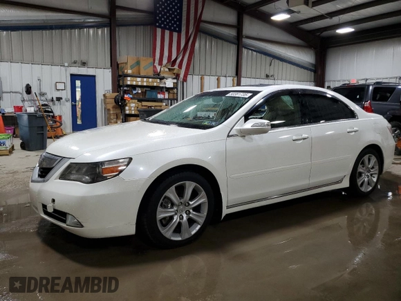 2009 Acura RL Tech Pkg with VIN JH4KB26679C002302, listed as a Copart auction lot 50381735 with 166,591 mi miles and Salvage Title. Bid and sale history available at carsss.com. Image 1.