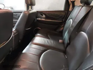 2005 Mercury Mariner Luxury with VIN 4M2YU57115DJ31547, listed as a IAAI auction lot 41565468 with 68,061 mi miles. Bid and sale history available at carsss.com. Image 8.