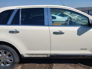 2007 Lincoln MKX with VIN 2LMDU68C77BJ11662, listed as a IAAI auction lot 41878466 with 142,723 mi miles. Bid and sale history available at carsss.com. Image 13.
