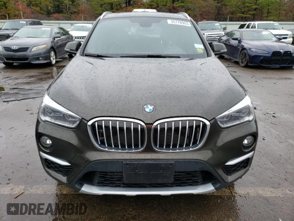 2018 BMW X1 xDrive28i with VIN WBXHT3C37J5K26738, listed as a Copart auction lot 35778903 with 34,916 mi miles. Bid and sale history available at carsss.com. Image 5.